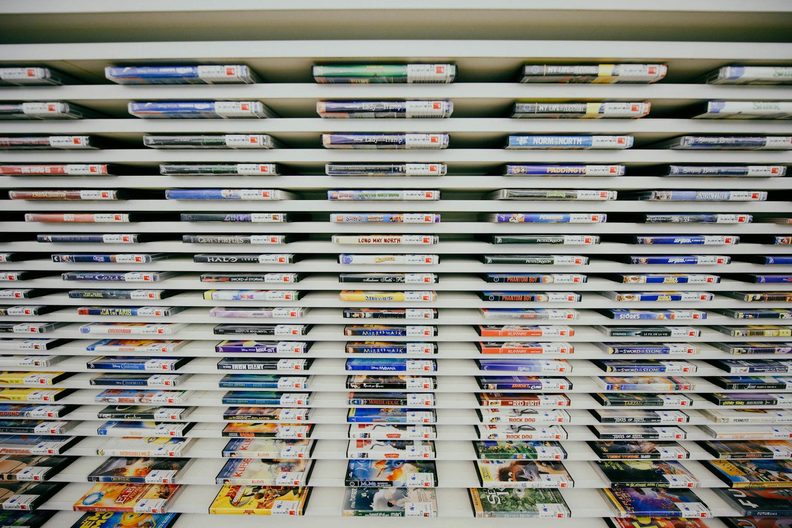Retro video game case collection on a shelf